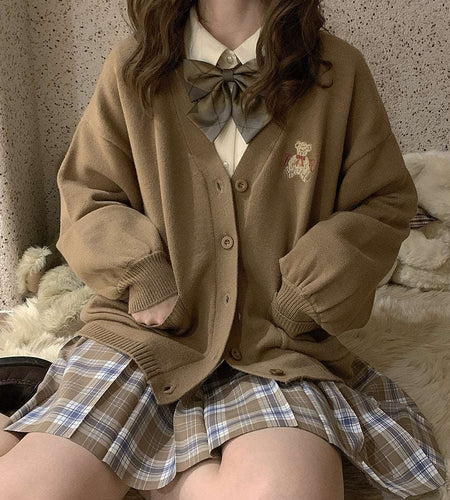 Cute Bear Embroidery CardiganIntroducing our new Cute Bear Embroidery Cardigan!
This stylish and cozy cardigan is perfect for the chilly days ahead. It features a charming bear embroidery designclothingHi Tech Glam LtdCute Bear Embroidery Cardigan