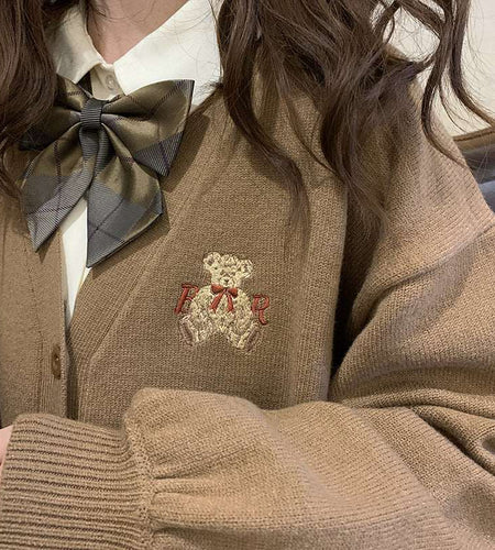 Cute Bear Embroidery CardiganIntroducing our new Cute Bear Embroidery Cardigan!
This stylish and cozy cardigan is perfect for the chilly days ahead. It features a charming bear embroidery designclothingHi Tech Glam LtdCute Bear Embroidery Cardigan