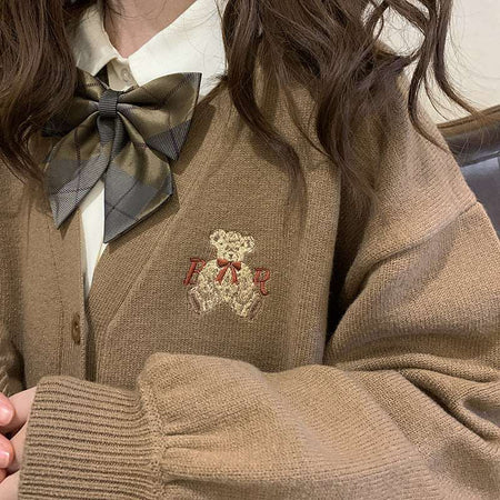 Cute Bear Embroidery CardiganIntroducing our new Cute Bear Embroidery Cardigan!
This stylish and cozy cardigan is perfect for the chilly days ahead. It features a charming bear embroidery designclothingHi Tech Glam LtdCute Bear Embroidery Cardigan