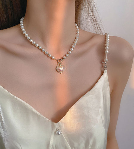Pearl Necklace
Introducing our stunning Pearl Necklace, the perfect accessory to elevate any outfit! The lustrous pearl beads exude elegance, while the sparkling rhinestone heart necklaceHi Tech Glam LtdPearl Necklace