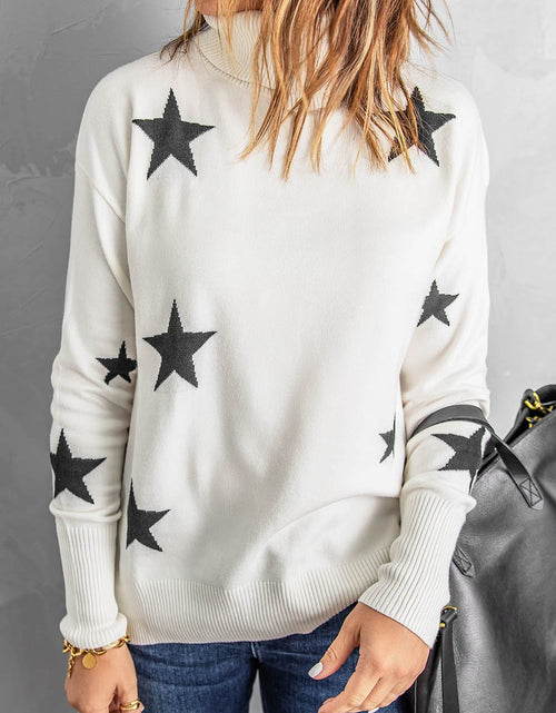 Bild in Galerie-Viewer laden, Star Print Sweater
Elevate your winter wardrobe with our Star Print Turtleneck, the ideal choice for staying warm and stylish during the cold season. This turtleneck not only providesHi Tech Glam LtdStar Print Sweater
