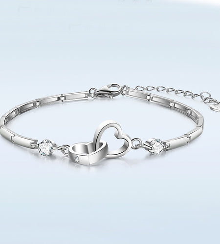 Double Heart Bracelet
Introducing our stunning Double Heart Bracelet, the ultimate symbol of love and devotion. Crafted from high-quality Sterling Silver, this bracelet is a timeless piejewelryHi Tech Glam LtdDouble Heart Bracelet
