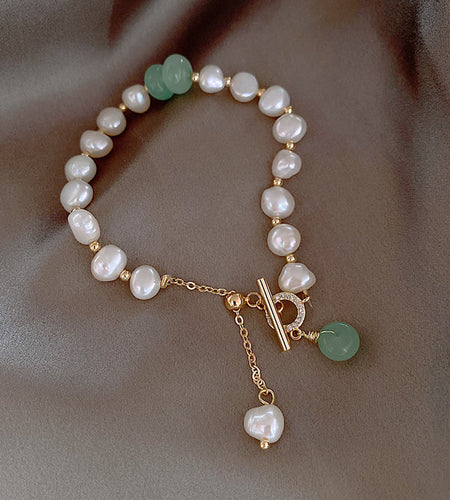 Freshwater Pearl Bracelet
Elevate Your Style with the Timeless Elegance of our Freshwater Pearl Bracelet
Indulge in the allure of nature's treasures with our Freshwater Pearl Bracelet, a symBraceletHi Tech Glam LtdFreshwater Pearl Bracelet