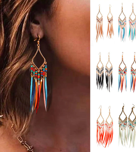 Tassels Feather EarringsTassels Feather Earrings
Add a touch of elegance and charm to your outfit with our Tassels Feather Earrings. These earrings are made with colorful beads and tassels,Womens earringsHi Tech Glam LtdTassels Feather Earrings